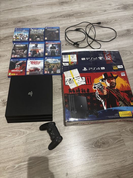 PS4 PRO 1TB + gry + pad