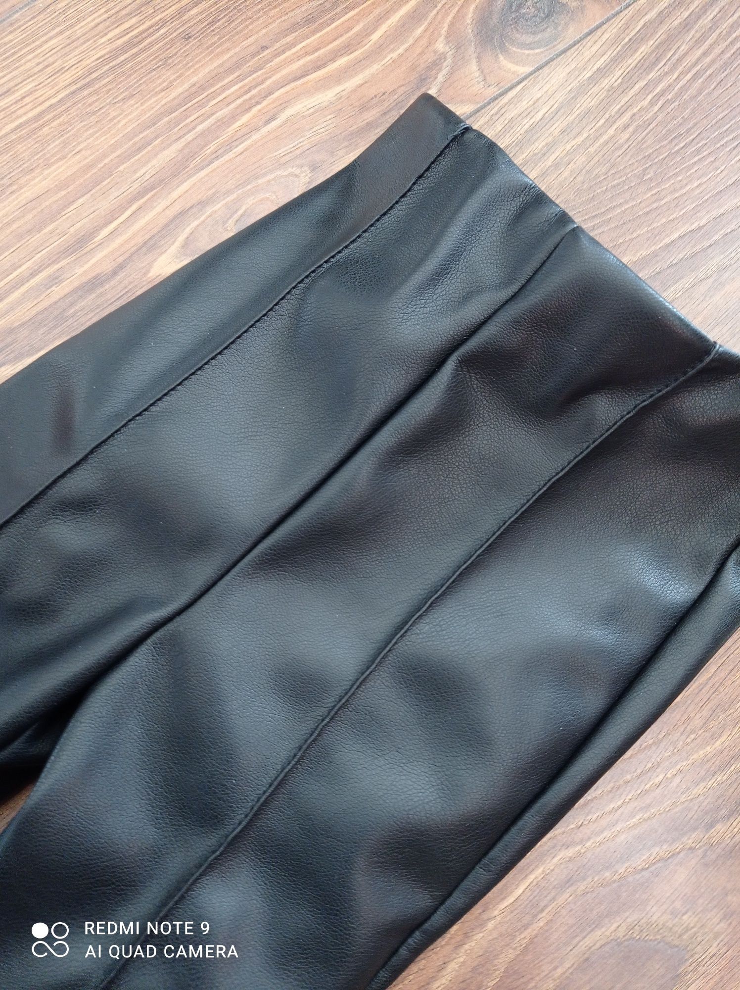 Spodnie leginsy czarne skórzane Reserved 122 cm 6-7 lat
