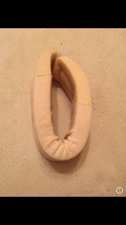 Colar cervical ou bota joanete usado