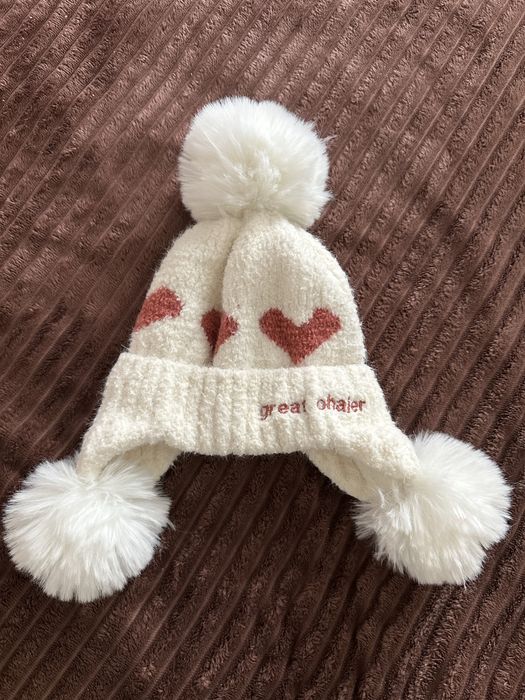 Теплі зимові шапочки