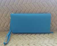 Продам гаманець-сумочку  блакитного кольору