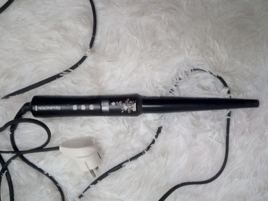 Конусна плойка для волосся