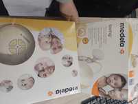 Laktator Medela SWING dodatkowe butelki Medela Calma GRATIS