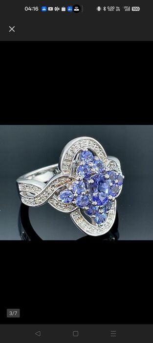 Sprzedam piękny srebny pierścionek z diamentami ta Tanzanitami+sertyf.