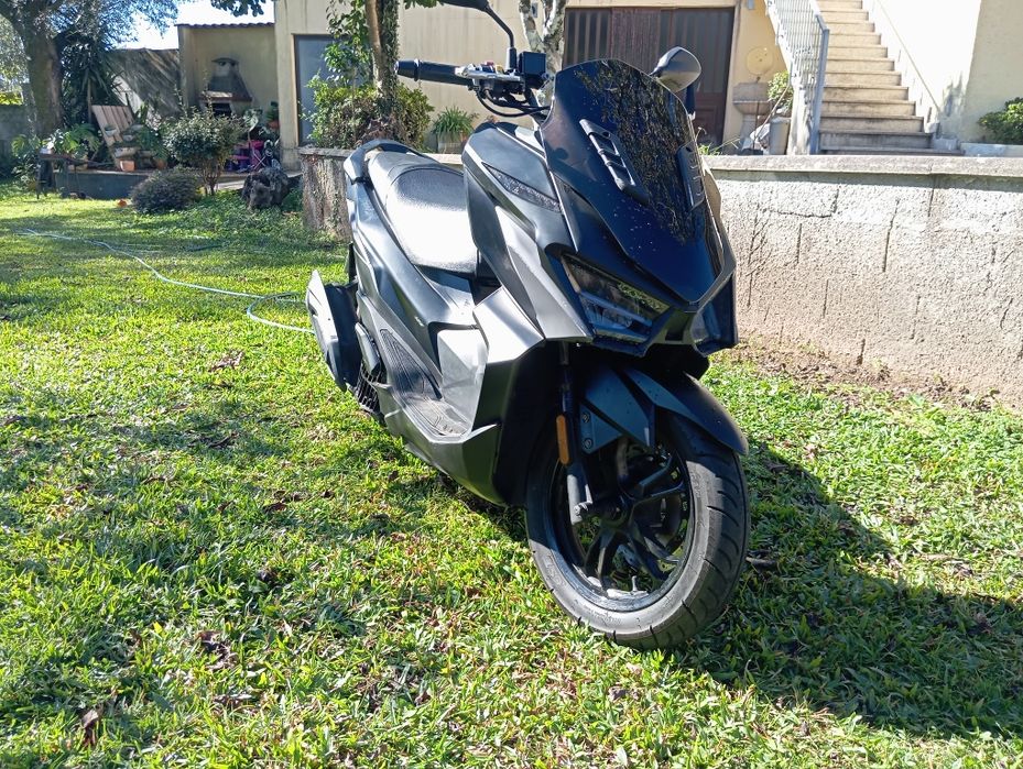 Sym jet x 125. Aquecimento a punhos