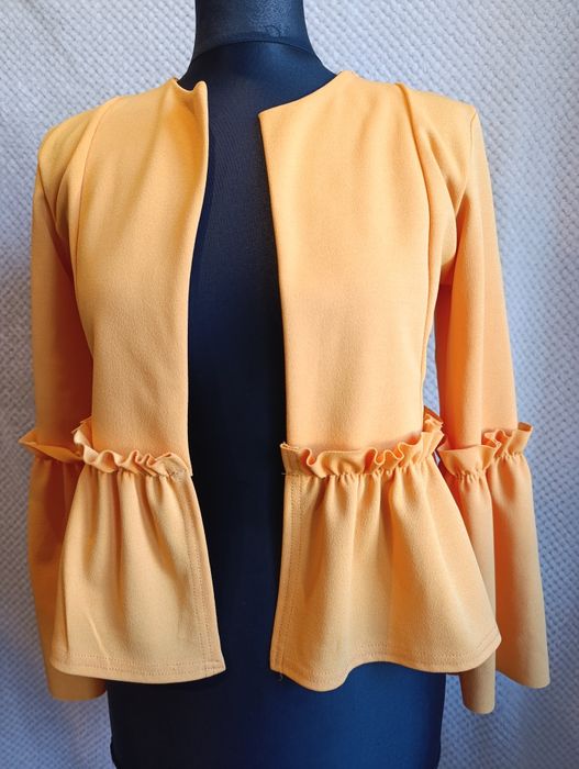 Pomarańczowa narzutka żakiecik