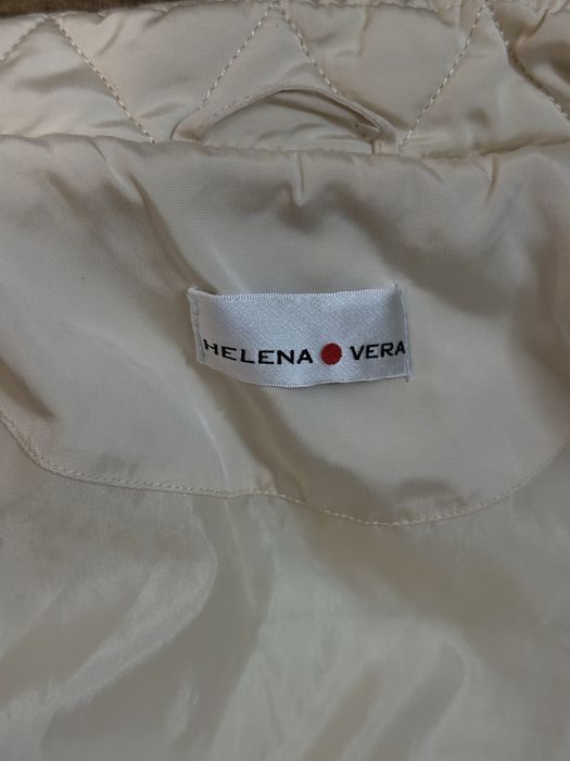 Жіноча куртка з резиночкою по бокам фірмова