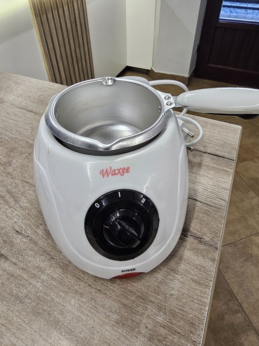 Podgrzewacz do wosku