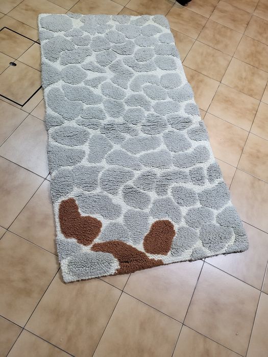 Tapete de lã como novo