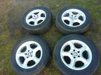 BMW X5 koła felgi aluminiowe opony zimowe 235/65 R17 MICHELIN