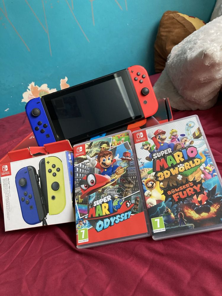 Nintendo Switch+ dwie gry Mario+ joykony