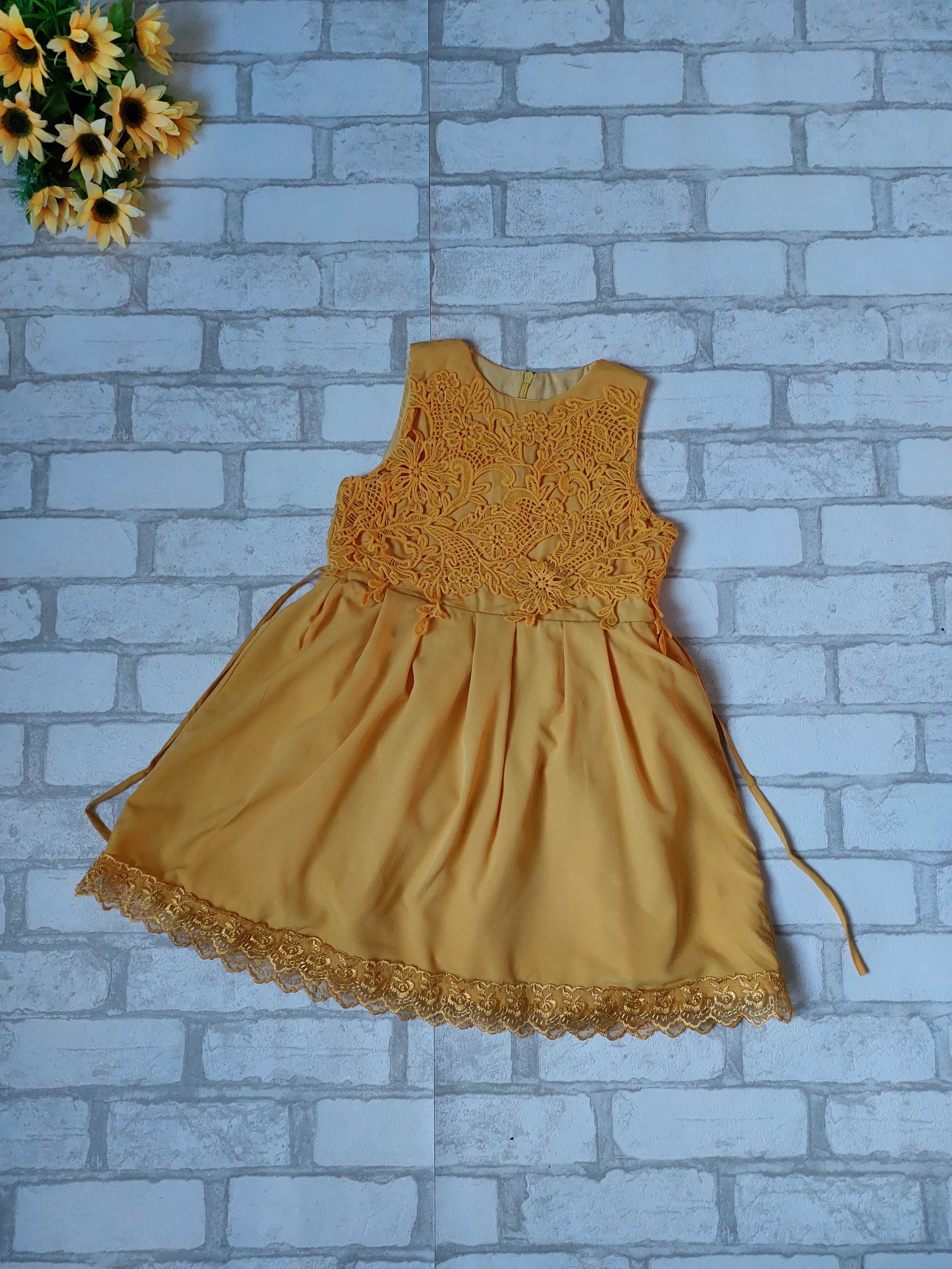 Нарядное желтое платье на девочку с кружевом