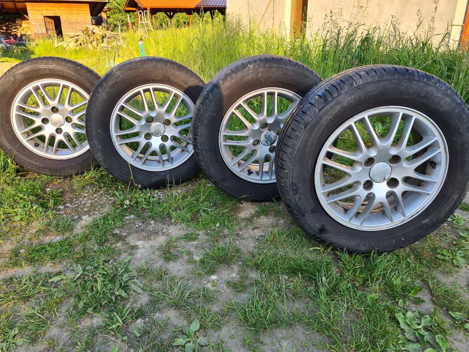 Felgi aluminiowe 15"'- Ford wraz z ..oponami Hankook