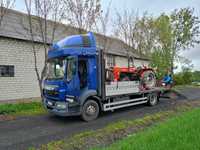 Transport maszyn rol pomoc drogowa usługi transportowe laweta do 8 ton