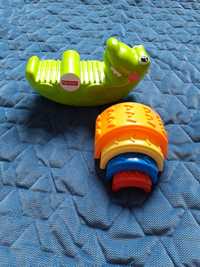 Fisher Price rozkolysany krokodyl