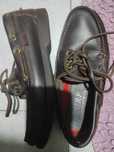 Sapatos de vela de pele