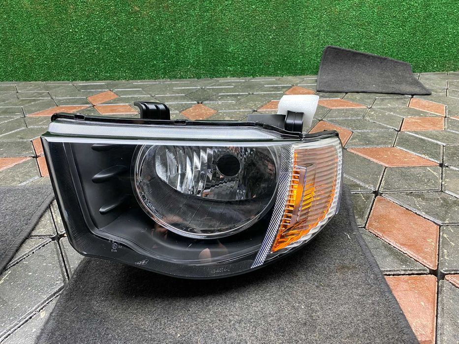 Фари передні нові Mitsubishi L200 2006-2015 до рест