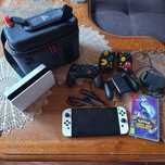 Nintendo Switch OLED + 1 gra, torba , Pad i Joycony.