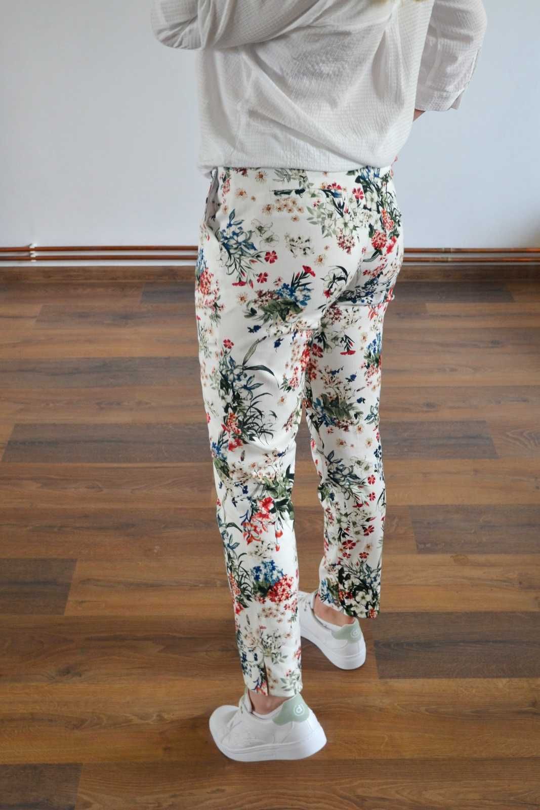 Nowe z metką białe spodnie chinosy w kwiaty floral Quiosque 38 M