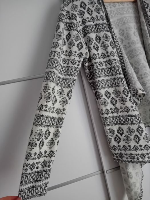 Kardigan H&M 170 narzutka asymetryczna biała we wzroki