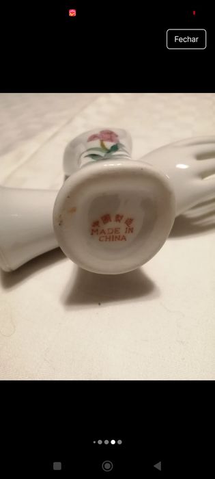 2 mãos em porcelana