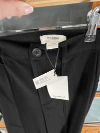 Nowe eleganckie spodnie z szerokimi nogawkami Pull&Bear