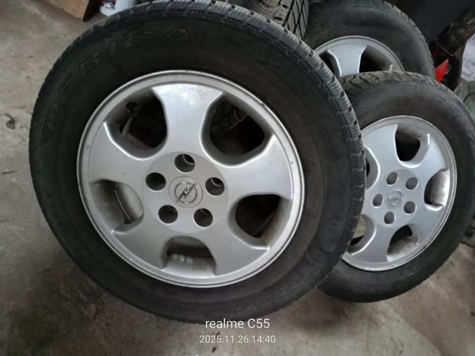 Felgi aluminiowe z oponami zimowymi opel r15