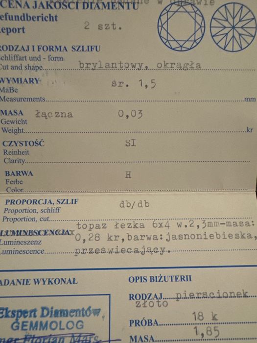 Złoty pierścionek z topazem i brylantami