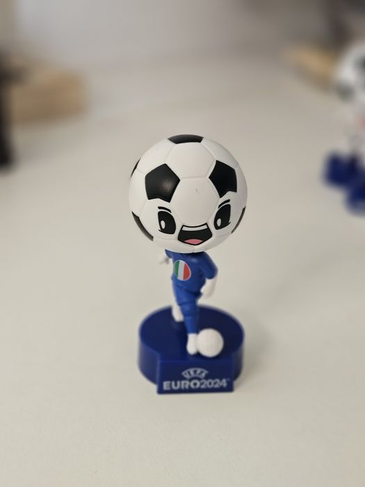 Jogadores com cabeça de bola europeu