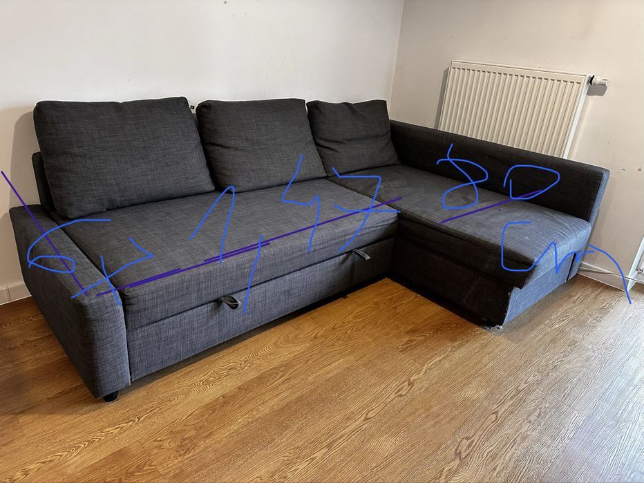 Szara rozkładana kanapa do salonu IKEA