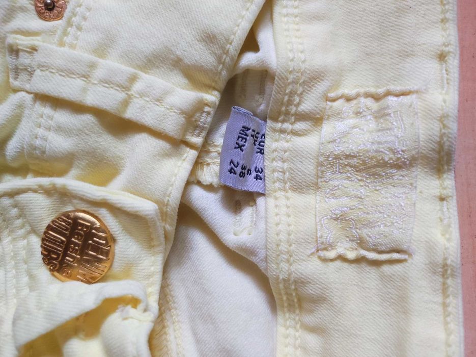 Żółte jeansy r.34