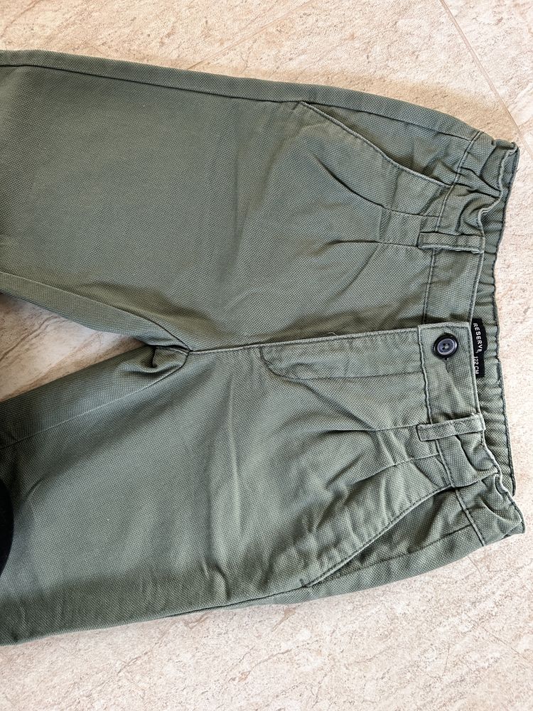 Spodnie reserved rozm. 122 cm stan idealny kolor khaki zielony