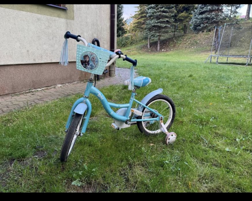 Rower dla dziewczynki z bocznymi kolkami