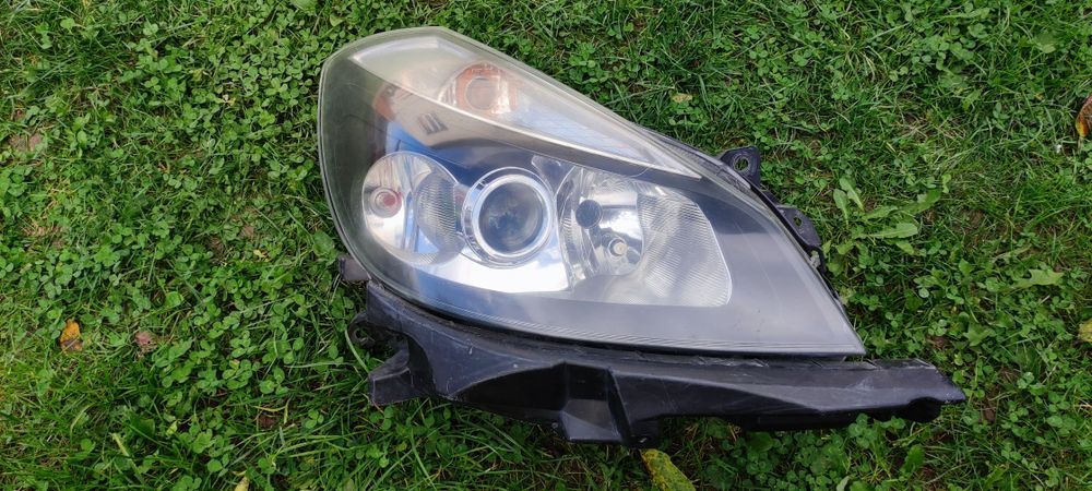 Фара 7701061076 renault clio 3
