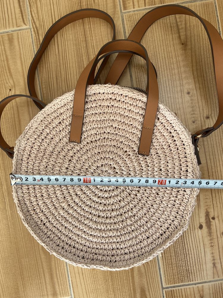 Кругла соломʼяна плетена сумка