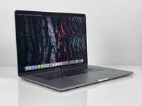 Apple MacBook Pro 15 i7 16GB RAM Radeon Pro Touch Bar/ID stan Idealny