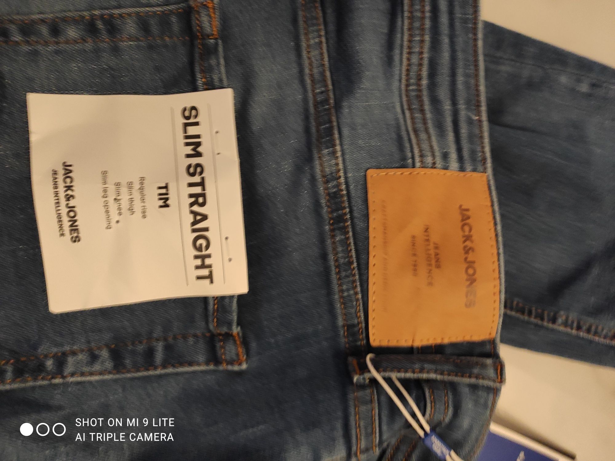 Spodnie jeans 34