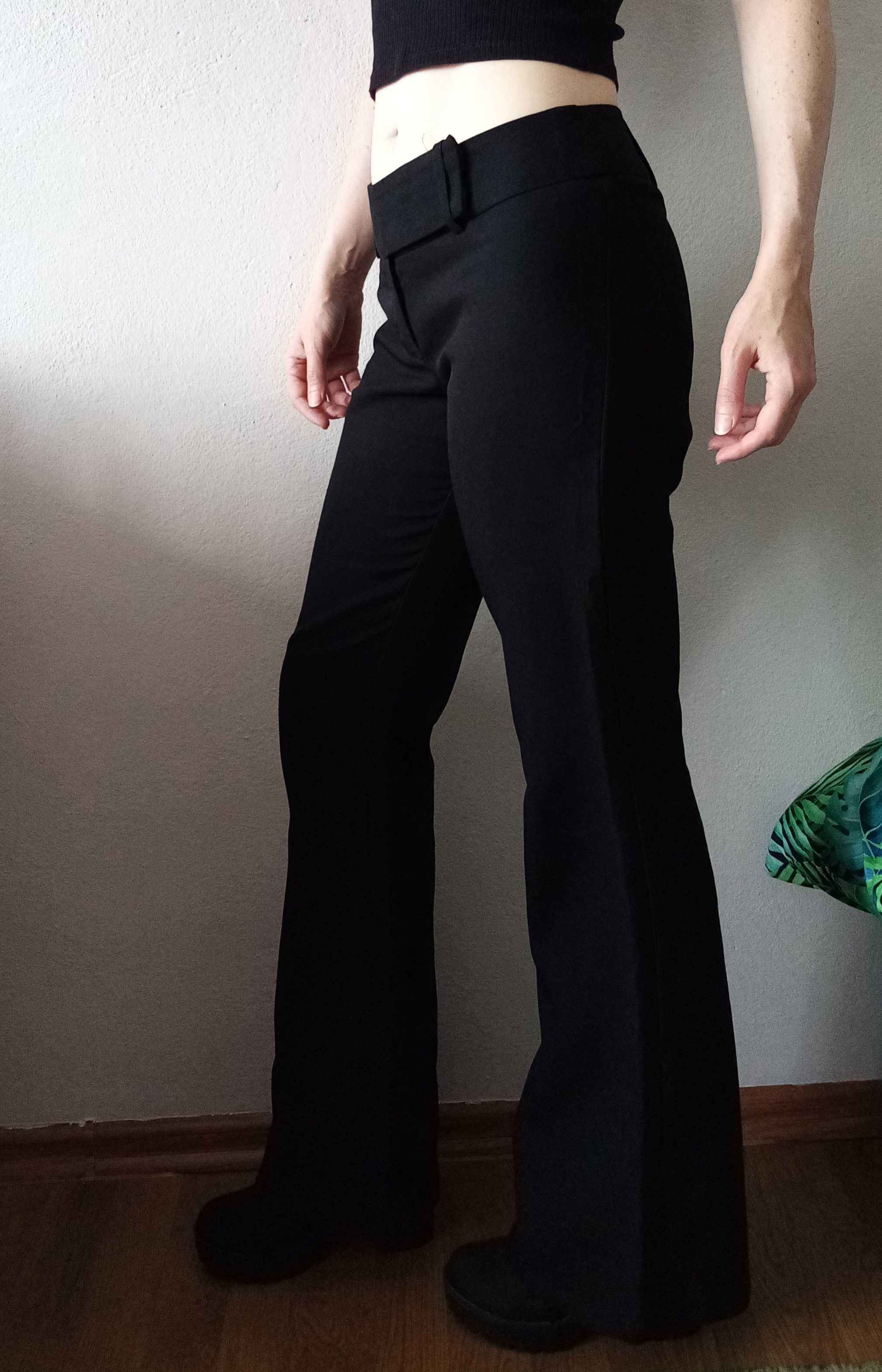 Modne szerokie spodnie czarne eleganckie biodrówki