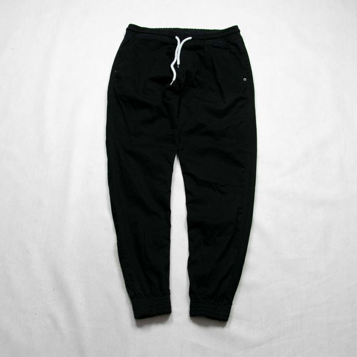 SSG spodnie joggery L męskie logowane