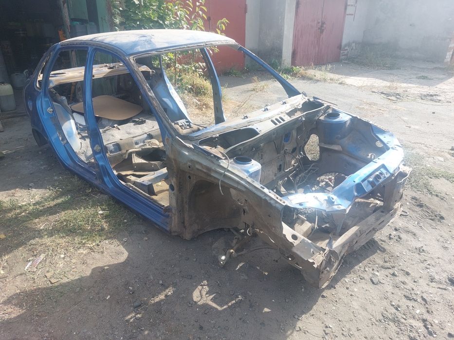 Кузов Ваз 1118 Калина,крыша,четверть,порог,ланжерон
