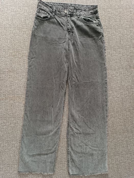 сірі кльош джинси