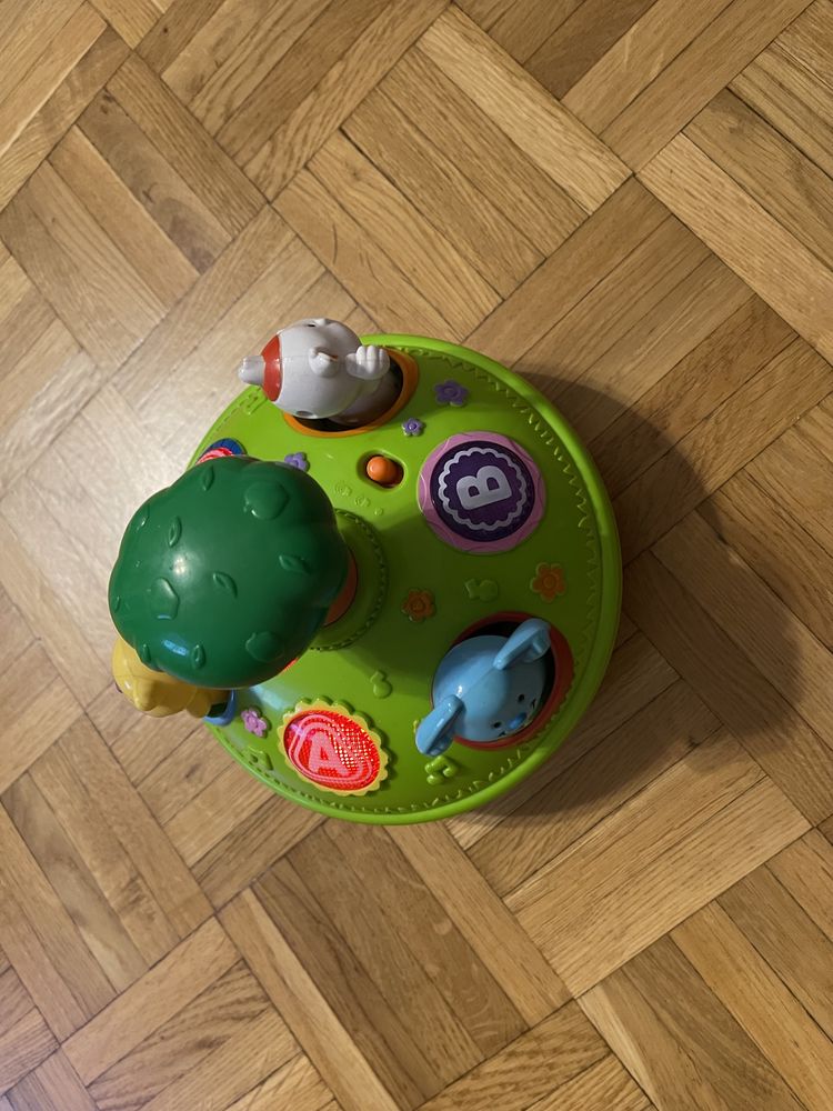 Zabawki Fisher Price  4szt. garnuszek + pilot + bączek, piramida