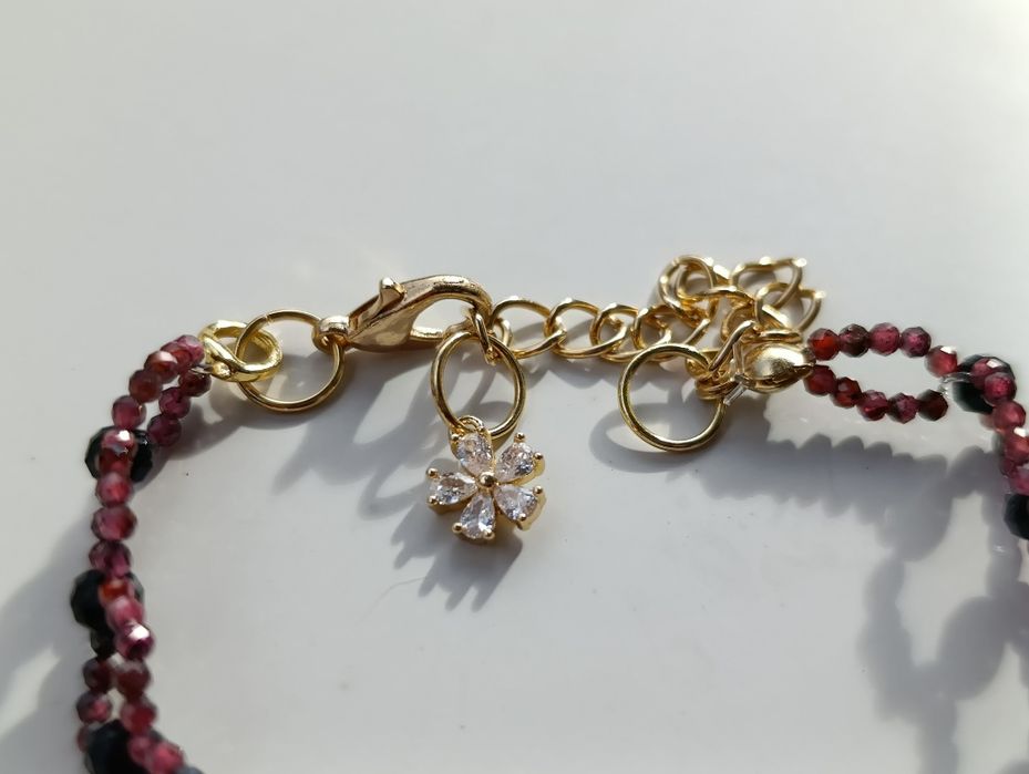 Ażurowa bransoletka z granatem