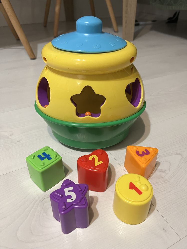 Garnuszek na klocuszek Fisher-Price