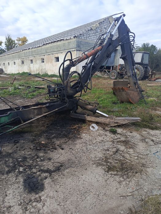 Екскаватор погрущик