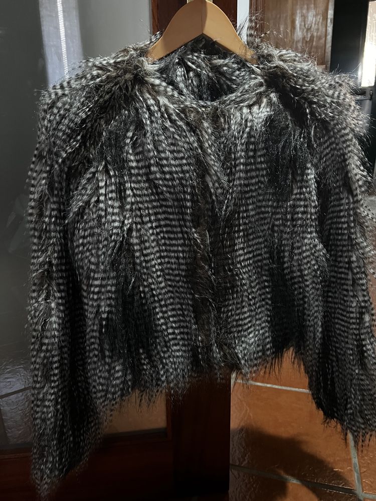 Casaco de pêlo castanho