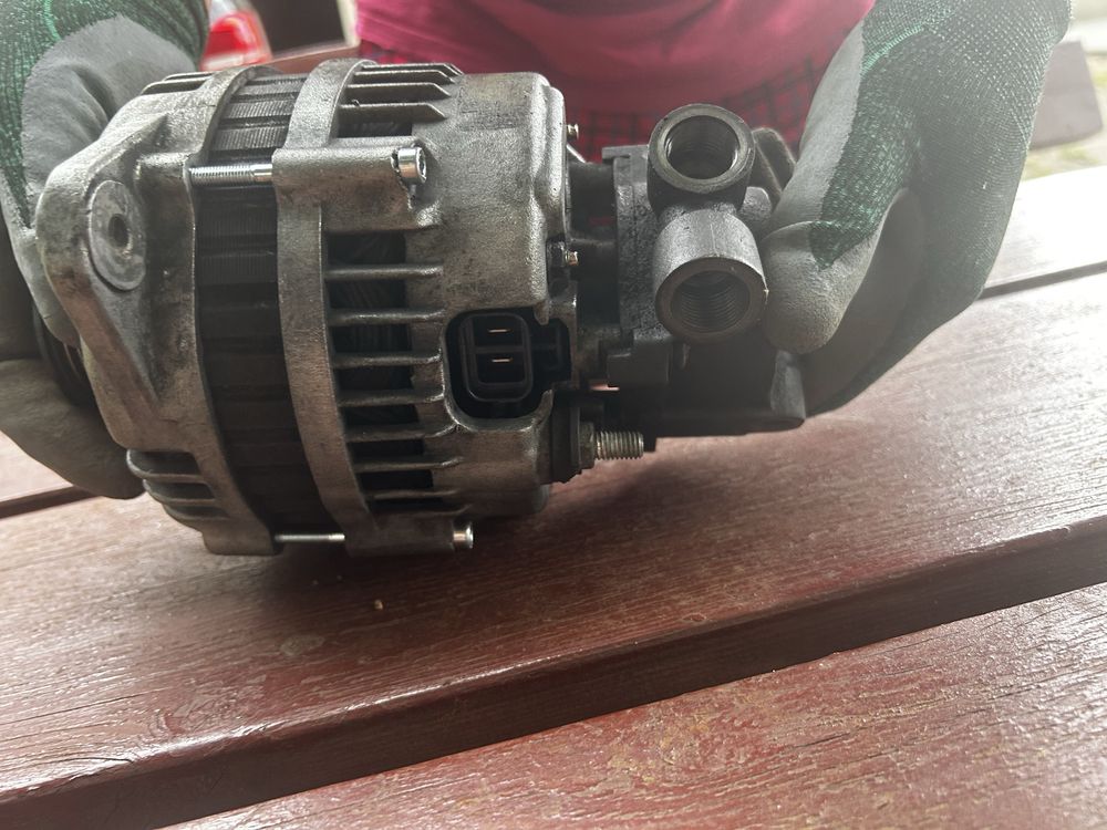 Alternator z Vacu pompą Opel Meriva 1.7