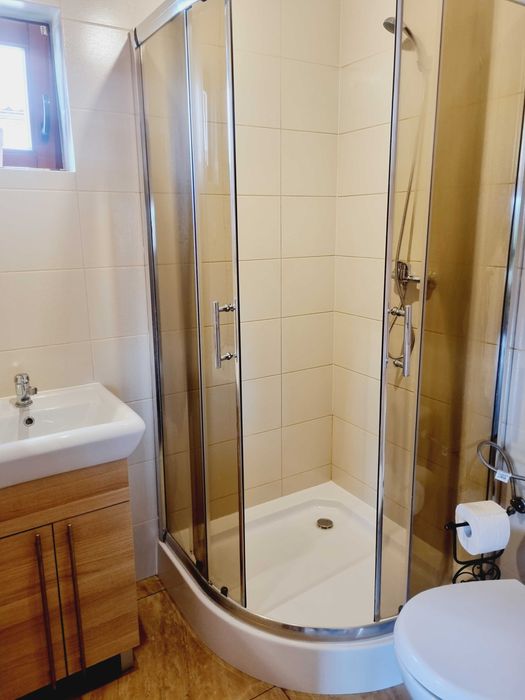 Domek nad jeziorem z linią brzegową na Mazurach Ryn Rybical - Staś