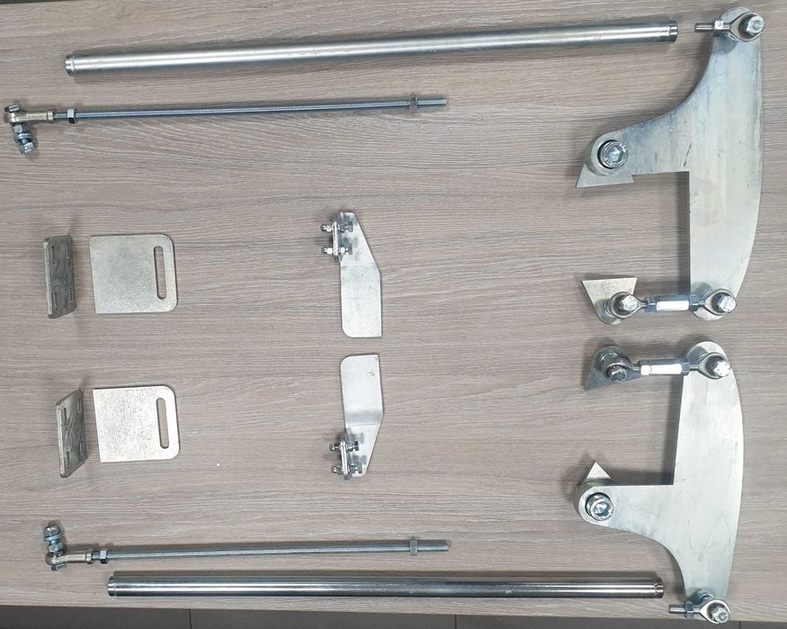 Brama harmonijkowa, łamana, mechanizm składania skrzydeł bramy