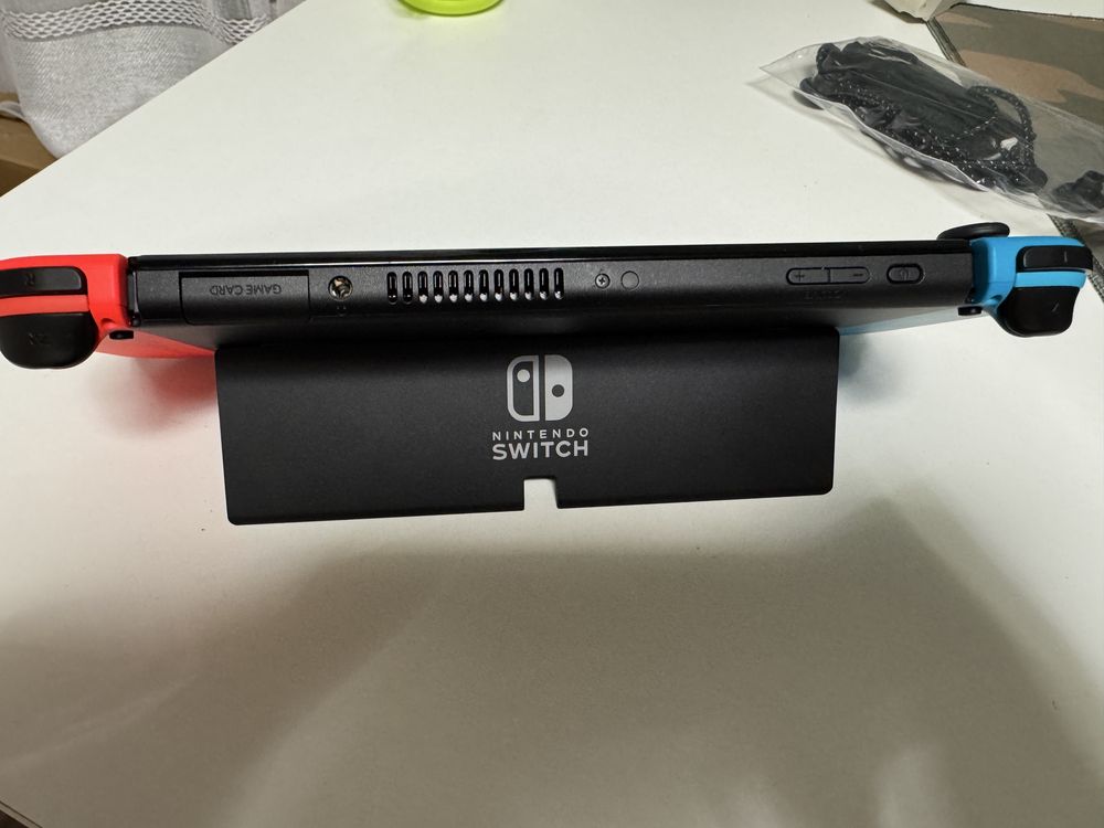 Nintendo Switch Oled , 4 гри , дод. Контроллер